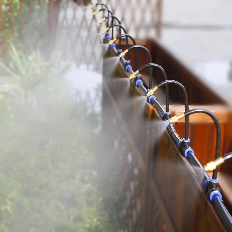 AquaBreeze nozzles misting along a rail